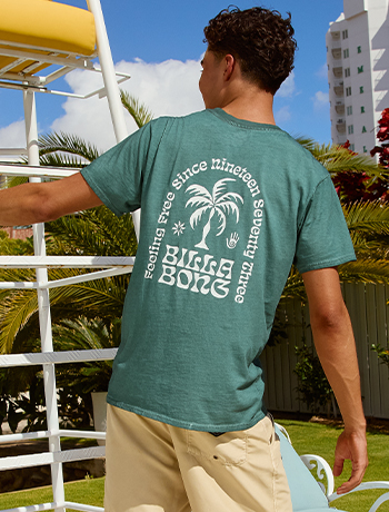 Man wearing a mad hueys branded top